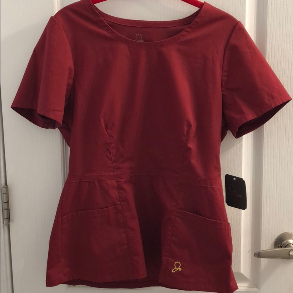Deep maroon scrub top